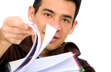 casual student flicking through pages on a notebook - isolated over a white background