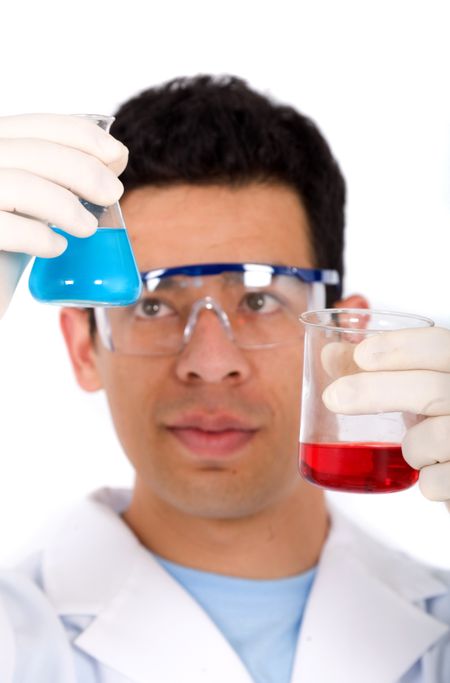 chemist with a mixture of liquids in red and blue - isolated over a white background