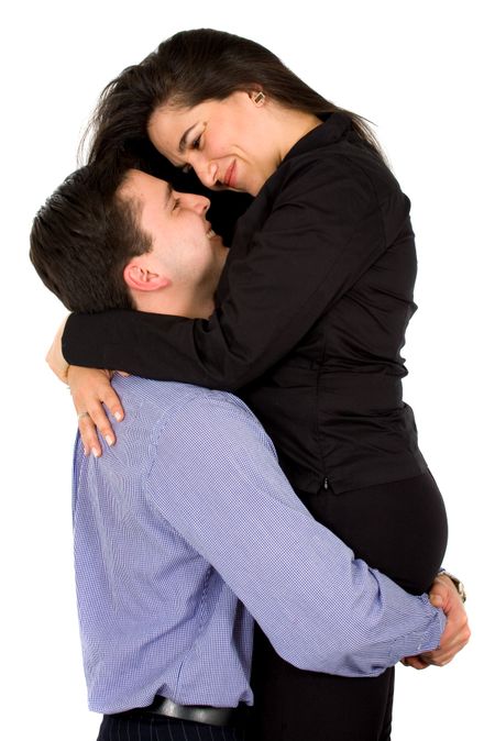 dreamy couple looking at each other over a white background