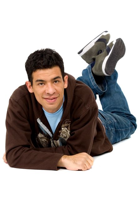 casual latin american man on the floor over a white background