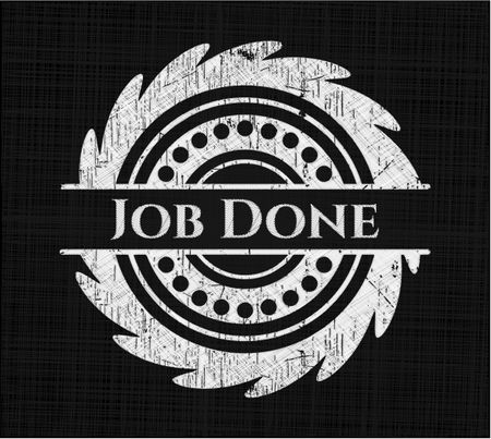 Job Done chalkboard emblem written on a blackboard