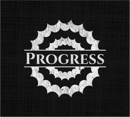 Progress chalkboard emblem written on a blackboard