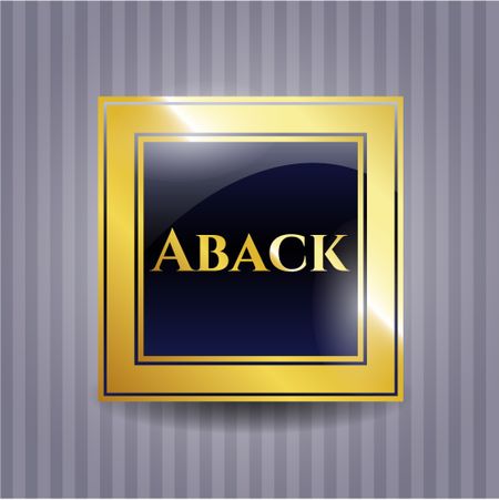 Aback gold emblem or badge