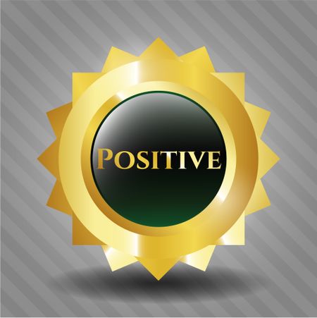 Positive gold emblem or badge