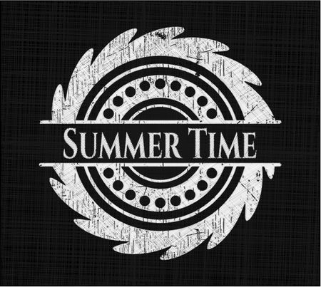 Summer Time chalk emblem written on a blackboard