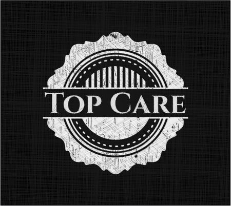 Top Care chalkboard emblem on black board