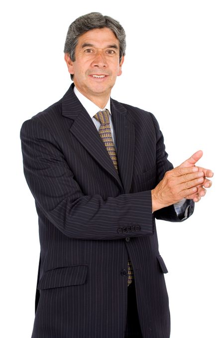 Business man applauding and smiling facing the camera - isolated over a white background