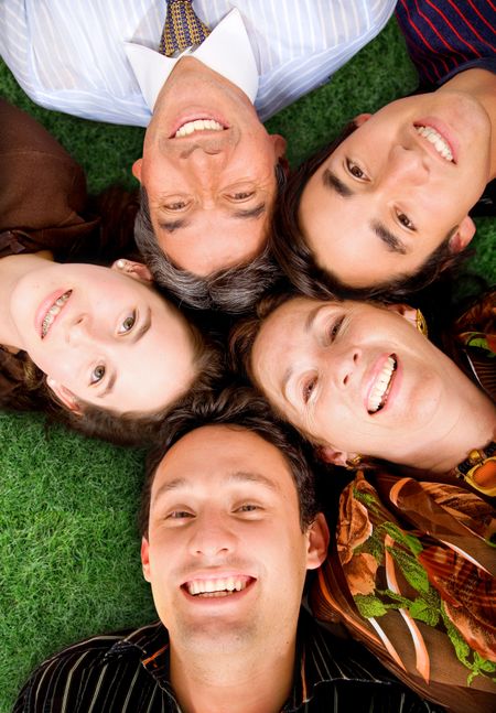 Happy family portrait while having fun outdoors