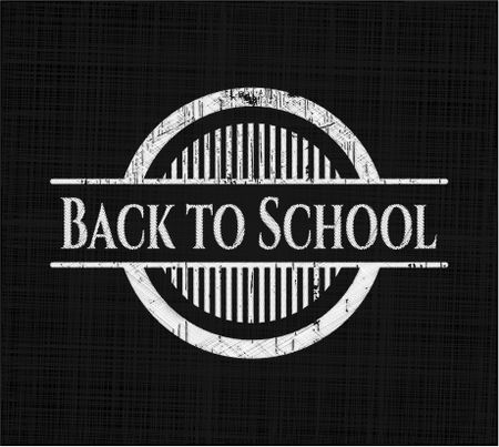 Back to School chalk emblem written on a blackboard