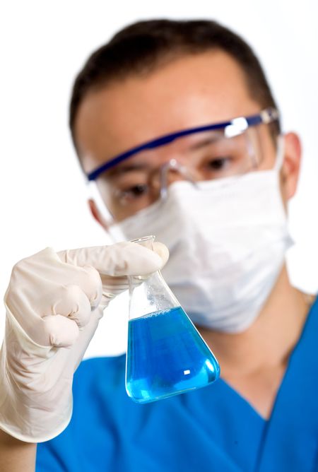 male scientist holding a bottle with liquid over a white background
