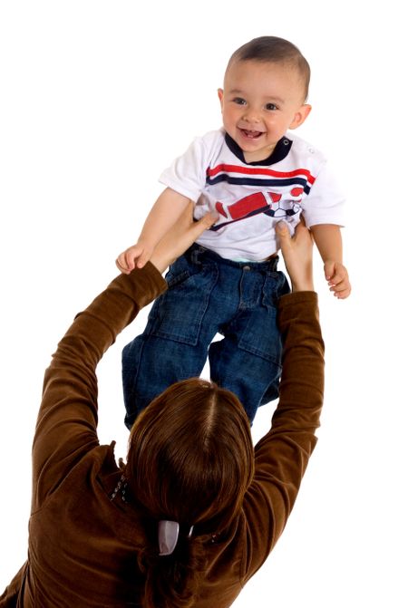 Baby smiling while having fun with her mum - isolated over a white background