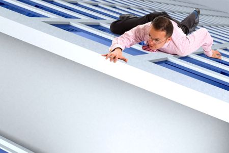 business man climbing a building almost reaching the top