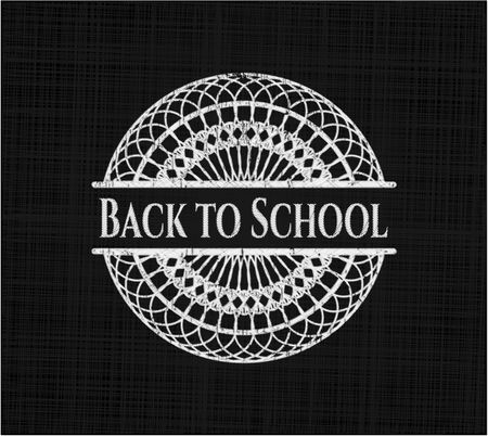 Back to School chalk emblem written on a blackboard