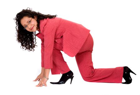 Start your business career - woman on the floor in racing position isolated over a white background
