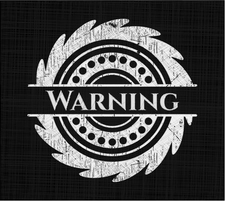 Warning chalkboard emblem on black board