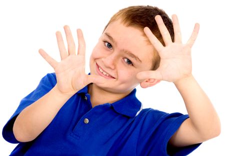 cute boy smiling doing the hand frame isolated over a white background