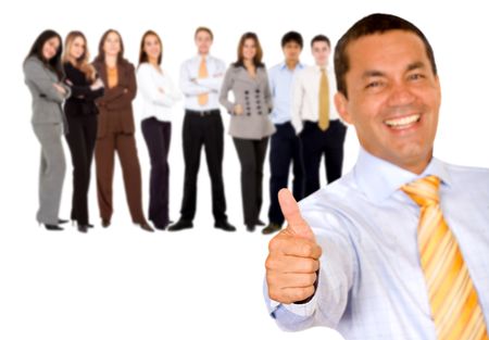 successful business man with thumbs up and his team isolated