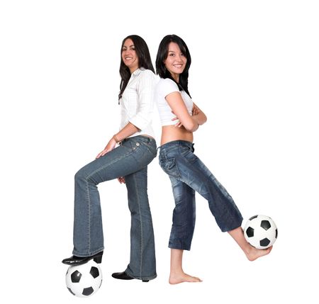 beautiful female footballers smiling isolated over white