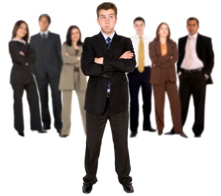 Hopeless businessman in front of a group isolated