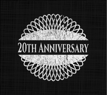 20th Anniversary chalkboard emblem written on a blackboard