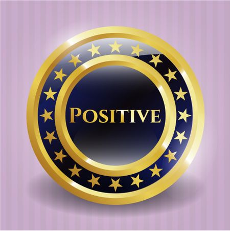 Positive golden emblem or badge