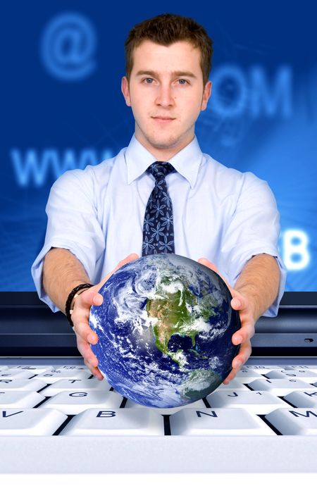 business man with a globe coming out of a laptop screen - good concept for global technology
