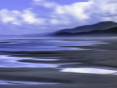 Scenic abstract of large tide pools on sandy beach along Pacific coast of Olympic Peninsula in the state of Washington, USA, for environmental or travel themes