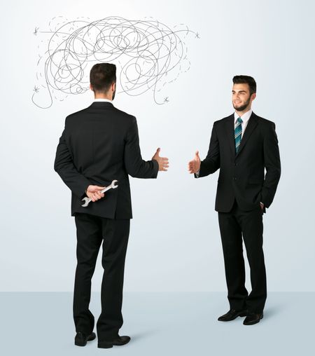 ruthless-businessman-hiding-weapon-weaving-plan-334017659 Ruthless businessman hiding a weapon and weaving plan around his head