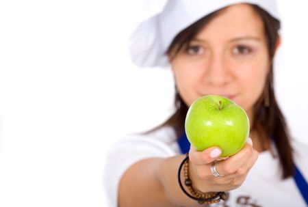 female chef with an apple - isolated over a white background