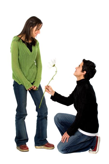 Casual man offering a flower to a girl - isolated over a white background