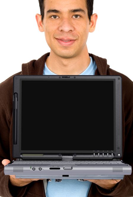 casual male student showing a laptop - isolated over white
