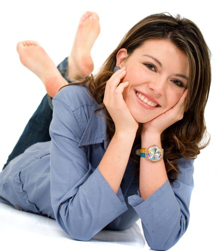 fashion woman portrait where she is smiling on the floor over a white background