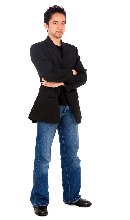 Casual man standing and smiling - isolated over a white background