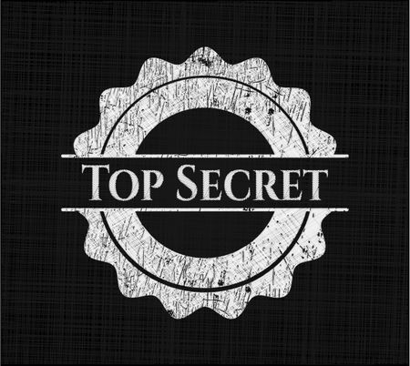 Top Secret chalkboard emblem written on a blackboard