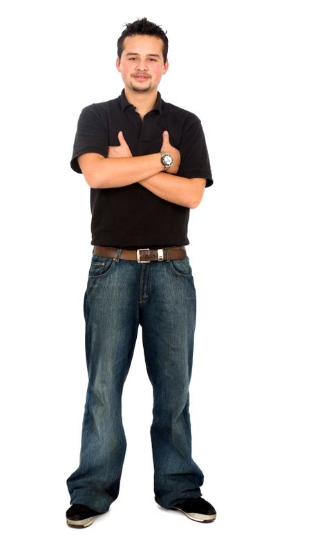 Casual friendly man in jeans and black tshirt standing – isolated over a white background