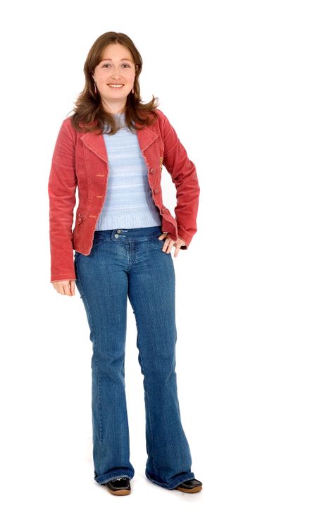 casual girl standing and smiling - isolated over a white background