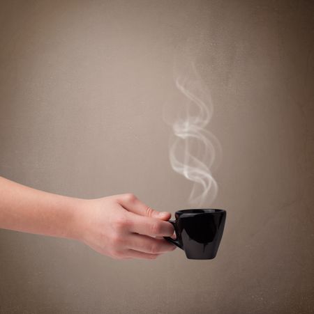 Coffee cup with abstract white steam, close up