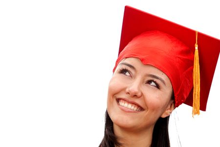 smiling happy girl on graduation day wearing gown