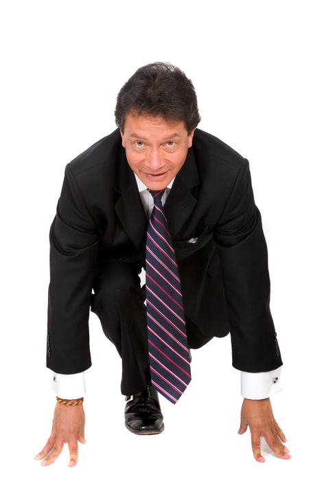 businessman ready to race - start his own business - isolated over a white background