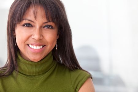 black business woman smiling at the office