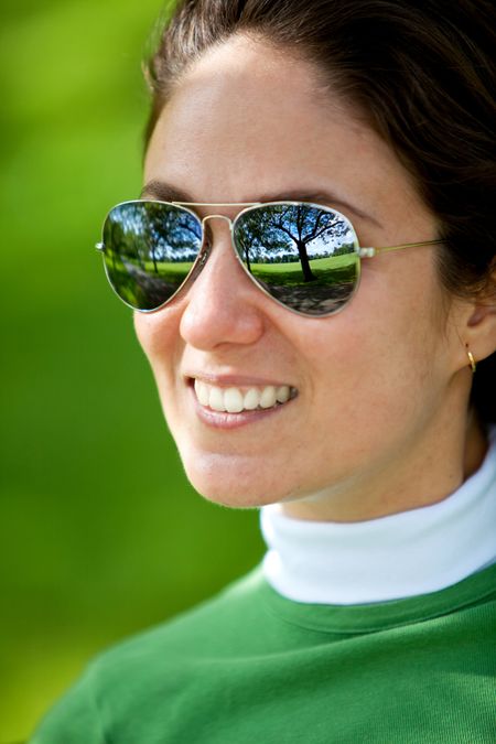 Portrait of a woman wearing sunglasses outdoors