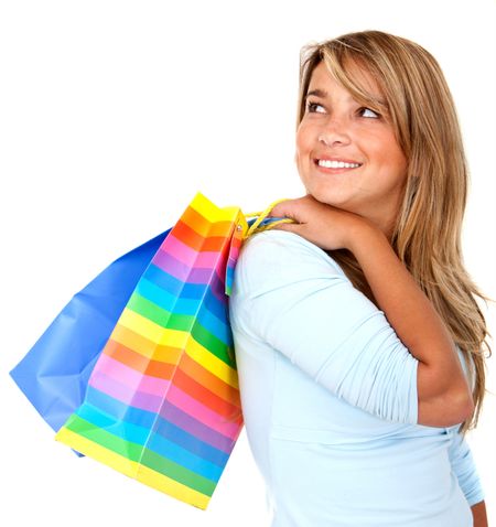 beautiful young woman with colorful shopping bags