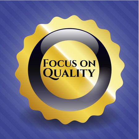 Focus on Quality gold emblem or badge