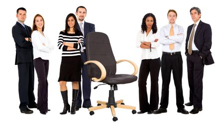 fullbody business group behind an empty chair isolated