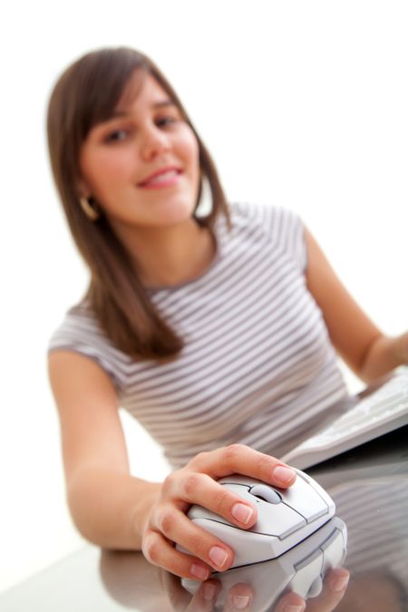 Young woman on a computer browsing isolated