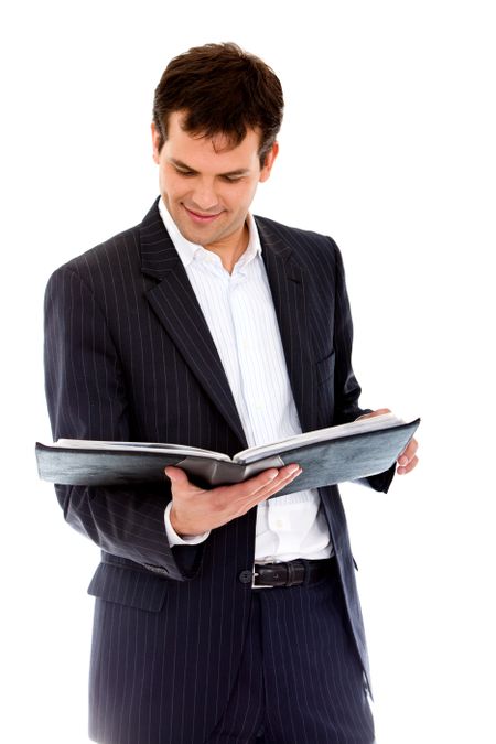 Business man looking at a portfolio isolated