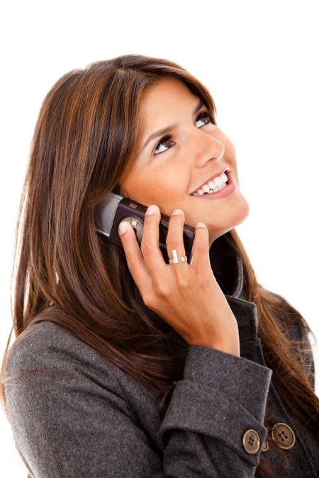 Business woman on the phone isolated over white