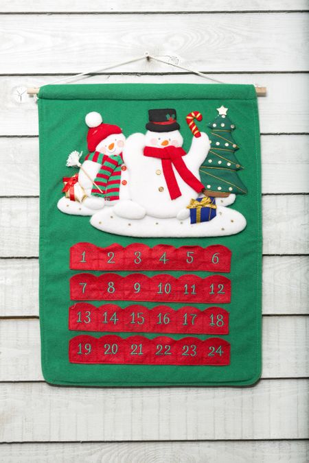 Festive snowman on a Christmas advent calendar