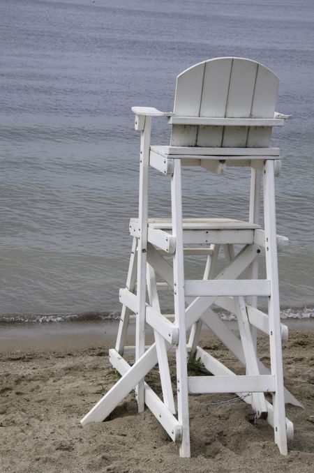 Lifeguard chair at water's edge
