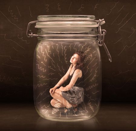 Businesswoman inside a jar with powerful hand drawn lines concept on bakcground